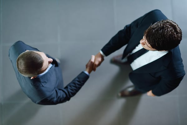 Two men shaking each others hands